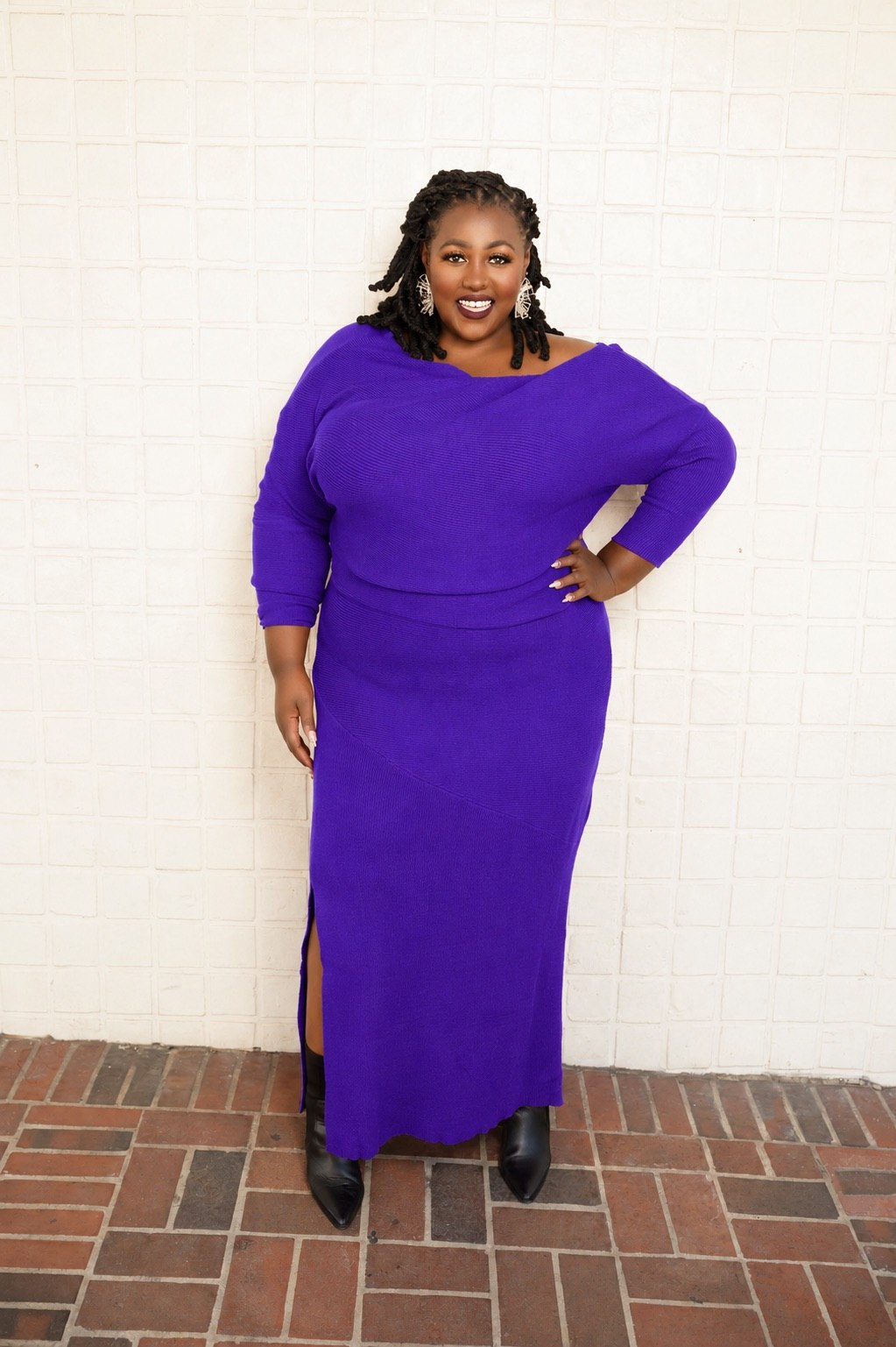 Marliceia Chavers, audit educator and speaker, in a purple dress